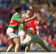 5 August 2002; Philip Clifford, Cork, in action against Mayo's Noel Connelly, left and James Nallen. Mayo v Cork, All Ireland Football Quarter - Final, Croke Park, Dublin. Picture credit; Damien Eagers / SPORTSFILE