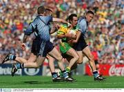 5 August 2002; Damien Diver, Donegal, in action against Dublin's Senan Connell, right, and Coman Goggins, left. Dublin v Donegal, All Ireland Football Quarter - Final, Croke Park, Dublin. Picture credit; David Maher / SPORTSFILE