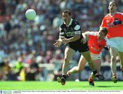 4 August 2002; Eamonn O'Hara, Sligo, in action against Kieran McGeeney, Armagh. Armagh v Sligo, All Ireland Football Quarter - Final, Croke Park, Dublin. Picture credit; Ray McManus / SPORTSFILE