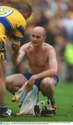 11 August 2002; Waterford Captain Fergal Hartley is consoled by Clare's Colin lynch. Clare v Waterford, All Ireland Hurling Semi - Final, Croke Park, Dublin. Picture credit; Ray McManus / SPORTSFILE