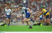 11 August 2002; Fergal Hartley, Waterford, in action against Clare's Alan Markham. Clare v Waterford, All Ireland Hurling Semi - Final, Croke Park, Dublin. Picture credit; Ray McManus / SPORTSFILE