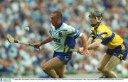 11 August 2002; Peter Queally, Waterford, in action against Clare's Niall Gilligan. Clare v Waterford, All Ireland Hurling Semi - Final, Croke Park, Dublin. Picture credit; Damien Eagers / SPORTSFILE