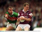 2 June 2002; Galway's Michael Donnellan is tackled by Marty McNicholas, Mayo. Mayo v Galway, Bank of Ireland Connacht Senior Football Championship, McHale Park, Castlebar, Co. Mayo. Picture credit; Ray McManus / SPORTSFILE