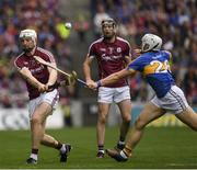 6 August 2017; Joe Canning of Galway, under pressure from Niall O'Meara of Tipperary, hits over what proved to be the winning point in the last minute of the GAA Hurling All-Ireland Senior Championship Semi-Final match between Galway and Tipperary at Croke Park in Dublin. Photo by Ray McManus/Sportsfile
