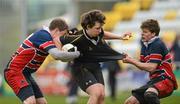 18 April 2012; Jeff Sargent, Rathcoole Community College, is tackled by Stephen Moran, left, and Luke Byrne, St. Colmcilles. South Dublin County Council Senior Cup Final, Rathcoole Community College v St. Colmcilles, Tallaght Stadium, Tallaght, Dublin. Picture credit: Ray McManus / SPORTSFILE