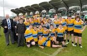 18 April 2012; The Rathcoole Community College team, along with Cllr. Mick Duff, Deputy Mayor, South Dublin County Council, and Leinster Branch President Stuart Bayley, extreme left, celebrate with the cup which they will share with St. Colmcilles. Both teams will keep the cup for 6 months after the game ended in a draw. South Dublin County Council Junior Cup Final, Rathcoole Community College v St. Colmcilles, Tallaght Stadium, Tallaght, Dublin. Picture credit: Ray McManus / SPORTSFILE