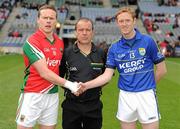 15 April 2012; Mayo captain Andy Moran shakes hands with Kerry captain Colm Cooper, right, in front of referee Eddie Kinsella. Allianz Football League Division 1 Semi-Final, Kerry v Mayo, Croke Park, Dublin. Picture credit: Ray McManus / SPORTSFILE