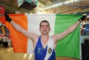 20 April 2012; Adam Nolan, Ireland, celebrates after victory over Ionut Gheorghe, Romania, in their Welterweight 69kg bout and qualifying for the London 2012 Olympic Games. AIBA European Olympic Boxing Qualifying Championships, Hayri Gür Arena, Trabzon, Turkey. Picture credit: David Maher / SPORTSFILE