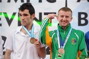 21 April 2012; Paddy Barnes, Ireland, after he received his bronze medal alongside gold medalist Ferhat Pehlivan, Turkey, in the Lightfly 46-49kg division. AIBA European Olympic Boxing Qualifying Championships, Hayri Gür Arena, Trabzon, Turkey. Picture credit: David Maher / SPORTSFILE