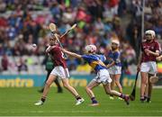 6 August 2017; Faye Mulrooney of Seir Kieran N.S., Co Mayo, representing Galway,  in action against Eve Dwyer   Glenbeg N.S., Dungarvan, Co Wateford, representing Tipperary, during INTO Cumann na mBunscol GAA Respect Exhibition Go Games at Galway v Tipperary - GAA Hurling All-Ireland Senior Championship Semi-Final at Croke Park in Dublin Photo by Ray McManus/Sportsfile