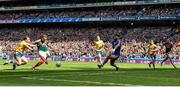 7 August 2017; Andy Moran of Mayo scores his side's second goal of the game despite the attention of Sean McDermott, left, and Colm Lavin of Roscommon during the GAA Football All-Ireland Senior Championship Quarter Final replay match between Mayo and Roscommon at Croke Park in Dublin. Photo by Ramsey Cardy/Sportsfile