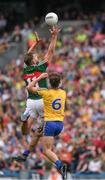 7 August 2017; Aidan O'Shea of Mayo in action against Sean Mullooly of Roscommon during the GAA Football All-Ireland Senior Championship Quarter-Final Replay match between Mayo v Roscommon at Croke Park, in Dublin. Photo by Ray McManus/Sportsfile