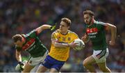 7 August 2017; Cian Connolly of Roscommon in action against Keith Higgins, left, and David Drake of Mayo during the GAA Football All-Ireland Senior Championship Quarter-Final Replay match between Mayo v Roscommon at Croke Park, in Dublin. Photo by Daire Brennan/Sportsfile