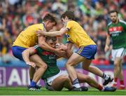 7 August 2017; Aidan O'Shea of Mayo in action against Seán Mullooly, left, and David Murray of Roscommon during the GAA Football All-Ireland Senior Championship Quarter-Final Replay match between Mayo v Roscommon at Croke Park, in Dublin. Photo by Daire Brennan/Sportsfile