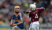 6 August 2017; Eddie Ó Cochlán of Scoil na nÓg, Gleannn Maghair, Co Cork, representing Tipperary, in action against Ryan Mc Closkey of Saint Canices Primary School, Dungiven, Co Derry, representing Galway, during the INTO Cumann na mBunscol GAA Respect Exhibition Go Games at Galway v Tipperary - GAA Hurling All-Ireland Senior Championship Semi-Final at Croke Park in Dublin. Photo by Piaras Ó Mídheach/Sportsfile