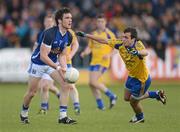 21 April 2012; Michael Brady, Cavan, in action against Donie Smith, Roscommon. Cadburys GAA Football All-Ireland Under 21 Championship Semi-final, Roscommon v Galway, Glennon Brothers Pearse Park, Co. Longford. Picture credit: Oliver McVeigh / SPORTSFILE