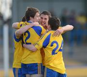 21 April 2012; Roscommon players, from left, Finbar Cregg, Ciaran Murtagh, Colin Compton and Darren Clabby celebrate at the end of the game. Cadburys GAA Football All-Ireland Under 21 Championship Semi-final, Roscommon v Galway, Glennon Brothers Pearse Park, Co. Longford. Picture credit: Oliver McVeigh / SPORTSFILE