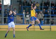 21 April 2012; Colin Compton, Roscommon, celebrates after scoring his side's second goal deep in injury time as Dara McVeety, Cavan, shows his disappointment. Cadburys GAA Football All-Ireland Under 21 Championship Semi-final, Roscommon v Galway, Glennon Brothers Pearse Park, Co. Longford. Picture credit: Oliver McVeigh / SPORTSFILE