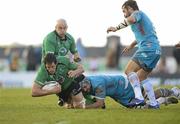 21 April 2012; Mike McCarthy, Connacht, is tackled by Marco Bortolami, Aironi. Celtic League, Connacht v Aironi, Sportsground, Co. Galway. Photo by Sportsfile