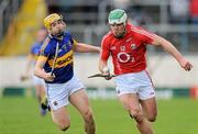 22 April 2012; Niall McCarthy, Cork, in action against David Young, Tipperary. Allianz Hurling League Division 1A Semi-Final, Cork v Tipperary, Semple Stadium, Thurles, Co. Tipperary. Picture credit: Brian Lawless / SPORTSFILE