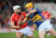 22 April 2012; Pa Bourke, Tipperary, in action against Sean Óg Ó hAilpin, Cork. Allianz Hurling League Division 1A Semi-Final, Cork v Tipperary, Semple Stadium, Thurles, Co. Tipperary. Picture credit: Brian Lawless / SPORTSFILE
