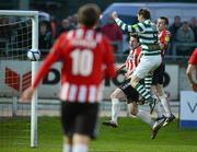 23 April 2012; Gary Twigg, Shamrock Rovers, beats Stephen McLaughlin and Dermot McCaffrey, Derry City to score his side's first goal. Setanta Sports Cup Semi-Final, Second Leg, Derry City v Shamrock Rovers, Brandywell, Derry. Picture credit: Oliver McVeigh / SPORTSFILE