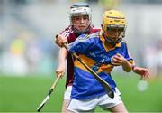 6 August 2017; Eddie Ó Cochlán of Scoil na nÓg, Gleannn Maghair, Co Cork, representing Tipperary, in action against Brian O Halloran of Kildalkey NS, Co Meath, representing Galway, during INTO Cumann na mBunscol GAA Respect Exhibition Go Games at Galway v Tipperary - GAA Hurling All-Ireland Senior Championship Semi-Final at Croke Park in Dublin Photo by Sam Barnes/Sportsfile