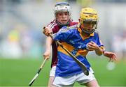 6 August 2017; Eddie Ó Cochlán of Scoil na nÓg, Gleannn Maghair, Co Cork, representing Tipperary, in action against Brian O Halloran of Kildalkey NS, Co Meath, representing Galway, during INTO Cumann na mBunscol GAA Respect Exhibition Go Games at Galway v Tipperary - GAA Hurling All-Ireland Senior Championship Semi-Final at Croke Park in Dublin Photo by Sam Barnes/Sportsfile