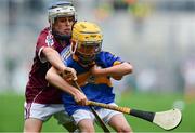 6 August 2017; Eddie Ó Cochlán of Scoil na nÓg, Gleannn Maghair, Co Cork, representing Tipperary, in action against Brian O Halloran of Kildalkey NS, Co Meath, representing Galway, during INTO Cumann na mBunscol GAA Respect Exhibition Go Games at Galway v Tipperary - GAA Hurling All-Ireland Senior Championship Semi-Final at Croke Park in Dublin Photo by Sam Barnes/Sportsfile