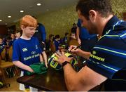 9 August 2017; David Rowan has his rugby ball signed by Robbie Henshaw during the Bank of Ireland Leinster Rugby Summer Camp at Longford RFC in Lisbrack, Longford. Photo by David Maher/Sportsfile