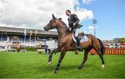 9 August 2017; Greg Patrick Broderick celebrates with a lap of honour on Zuidam, after winning The Speed Stakes, the first international competition of the show, during the Dublin Horse Show at the RDS in Ballsbridge, Dublin. Photo by Cody Glenn/Sportsfile