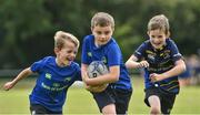 9 August 2017; Joshua Glynne in action against Cillian Roe, left, and Luke McKenna during the Bank of Ireland Leinster Rugby Summer Camp at De La Salle RFC in Glenamuck North, Dublin. Photo by Matt Browne/Sportsfile