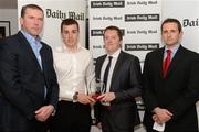16 April 2012; William Egan, UCC, is presented with the Irish Daily Mail Hurling Future Champions 2012 award by Irish Daily Mail GAA columnist Liam Hayes, left, Joe Callaghan, sports editor Irish Daily Mail, and, right, Chairman Comhairle Ardoideachais Ray O'Brien. Irish Daily Mail Future Champions Awards 2012, Croke Park, Dublin. Photo by Sportsfile