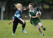 24 April 2012; Hazel Jackson, St. Mac Dara's Community College, Templeogue, in action against Rachel Cosgrave, Lucan Community College. Leinster Rugby Girls Blitz, St. Marys RFC, Templeville Road, Dublin. Photo by Sportsfile
