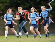 24 April 2012; Lisa Redmond, Clane, in action against Lauren Rodriguez, left, Leanne Barry and Aisling Kane, right, Manor House, Raheny. Leinster Rugby Girls Blitz, St. Marys RFC, Templeville Road, Dublin. Photo by Sportsfile