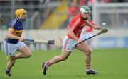 22 April 2012; Niall McCarthy, Cork, in action against David Young, Tipperary. Allianz Hurling League Division 1A Semi-Final, Cork v Tipperary, Semple Stadium, Thurles, Co. Tipperary. Picture credit: Brian Lawless / SPORTSFILE