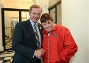 25 April 2012; An Taoiseach Enda Kenny T.D. with Special Olympics Athlete Killian Moran, from Dundalk, Co. Louth, at Government Buildings ahead of Special Olympics Ireland’s Annual Collection Day on Friday April 27th. This is the biggest annual fundraising event in aid of Special Olympics Ireland and will see more than 4,000 volunteers take to the streets in over 200 locations throughout Ireland on the day. Government Buildings, Upper Merrion Street, Dublin. Picture credit: Ray McManus / SPORTSFILE