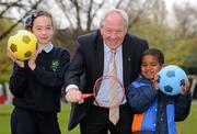 26 April 2012; Minister of State for Tourism & Sport, Michael Ring T.D. today launched the HSE Community Games 2012 National Finals. The HSE Community Games finals will take place this year in Athlone Institute of Technology, Athlone, Co. Westmeath, over three weekends: 5th – 27th May 2012, 17th – 19th August 2012 and 24th – 26th August 2012. At the launch is Minister of State for Tourism & Sport, Michael Ring T.D. with Sinead Collins, age 10, from Sallins, Co. Kildare, and Samuel Ogidan, age 6, from Adamstown. HSE Community Games 2012 National Finals Launch, St Stephens Green, Dublin. Picture credit: Brian Lawless / SPORTSFILE