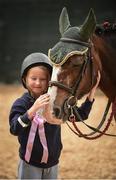 10 August 2017; Aisling Grant, age 7, from Donabate, Co Dublin, pats goodbye to her pony after her pony ride at the Dublin Horse Show at the RDS in Ballsbridge, Dublin. Photo by Cody Glenn/Sportsfile