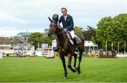 10 August 2017; Bertram Allen of Ireland celebrates with a lap of honour on Izzy By Picobello after winning the Anglesea Serpentine Stakes at Dublin Horse Show at the RDS in Ballsbridge, Dublin. Photo by Cody Glenn/Sportsfile