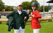11 August 2017; Cian O'Connor of Ireland in conversation with Lillie Keenan of USA during a walk of the course ahead of the FEI Nations Cup during the Dublin International Horse Show at RDS, Ballsbridge in Dublin. Photo by Cody Glenn/Sportsfile