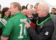 28 April 2012; An Taoiseach Enda Kenny T.D. has his jersey signed by Republic of Ireland manager Giovanni Trapattoni ahead of the Enda's Trek with Trap's Green Army Charity Climb. Croagh Patrick, Murrisk, Carrowmacloughlin, Co. Mayo. Picture credit: Matt Browne / SPORTSFILE