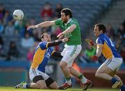 28 April 2012; Seamus Quigley, Fermanagh, in action against Anthhony McLoughlin, left, and Alan Byrne, Wicklow. Allianz Football League, Division 4 Final, Fermanagh v Wicklow, Croke Park, Dublin. Picture credit: Ray McManus / SPORTSFILE