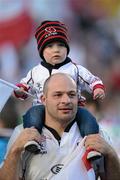 28 April 2012; Ulster's Rory Best, with his son Ben, aged 2, celebrates after the match. Heineken Cup Semi-Final, Ulster v Edinburgh, Aviva Stadium, Lansdowne Road, Dublin. Picture credit: Brendan Moran / SPORTSFILE