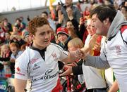 28 April 2012; Paddy Jackson, Ulster, celebrates with the fans after the final whistle. Heineken Cup Semi-Final, Ulster v Edinburgh, Aviva Stadium, Lansdowne Road, Dublin. Picture credit: Oliver McVeigh / SPORTSFILE