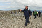 28 April 2012; An Taoiseach Enda Kenny T.D. arrives at the summit of Croagh Patrick following the Enda's Trek with Trap's Green Army Charity Climb. Croagh Patrick, Murrisk, Carrowmacloughlin, Co. Mayo. Picture credit: Tommy Grealy / SPORTSFILE