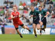 29 April 2012; Aidan Cassidy, Tyrone, in action against Peter Kelly, Kildare. Allianz Football League, Division 2 Final, Tyrone v Kildare, Croke Park, Dublin. Picture credit: Oliver McVeigh / SPORTSFILE