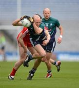 29 April 2012; Hugh McGrillen, Kildare, supported by James Kavanagh, in action against Seán Cavanagh, Tyrone. Allianz Football League, Division 2 Final, Tyrone v Kildare, Croke Park, Dublin. Picture credit: Ray McManus / SPORTSFILE