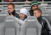29 April 2012; Cavan footballer Sean Johnston, centre, with Kildare's Brian Flanagan, right, sitting on the Kildare substitutes bench during the game. Allianz Football League, Division 2 Final, Tyrone v Kildare, Croke Park, Dublin. Picture credit: Oliver McVeigh / SPORTSFILE
