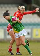 29 April 2012; Katie O'Brien, Meath, in action against Brid Stack, Cork. Bord Gáis Energy Ladies National Football League, Division 1 Semi-Final, Cork v Meath, Crettyard, Co. Laois. Picture credit: Brian Lawless / SPORTSFILE